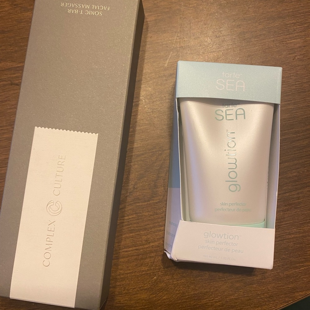 Tarte sea glowtion skin perfector and complex culture facial massager.